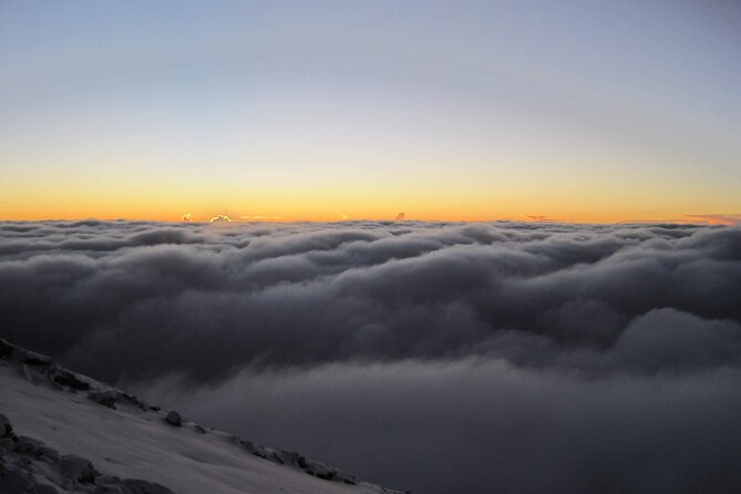 5 Days Marangu Route Kilimanjaro hiking - Day 4: Gilman’s Point, Uhuru Peak, and the long descent