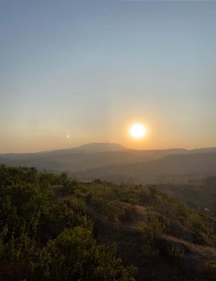 Arusha: Golden Hour Walk & Sunset Viewpoint Over Mount Meru - Starting among farms and homes in Ngaramtoni Village