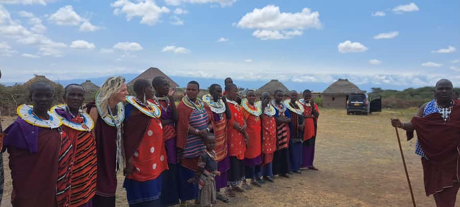 Arusha: Maasai Village Tour - Wearing Maasai clothing and joining the jumping dance