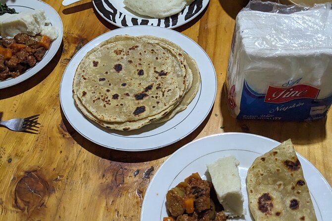Arusha: Traditional Tanzania Cooking Class & Food Market Tour - Eating what you have prepared