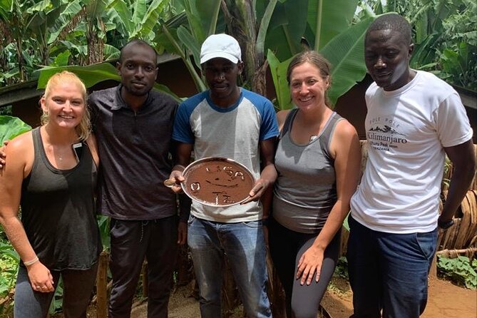 Day Trip Coffee Tour and Materuni Waterfalls - Making coffee by an authentic local method