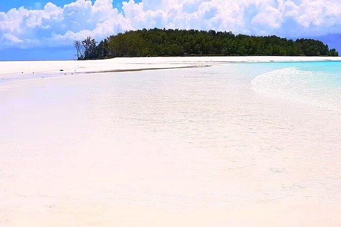 Dolphin Tour, Jozani Forest Tour, Kuza Cave Tour, Paje Beach,The Rock Restaurant - Kuza Cave: limestone, clear water, and Swahili culture