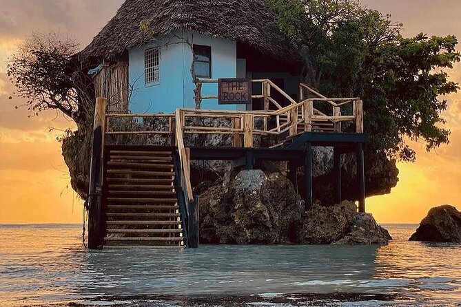 Dolphin Tour; Kuza Cave Tour; Paje Beach; The Rock Restaurant; Jozani Forest - Mnemba Island: snorkeling, dolphins, and a sandbank