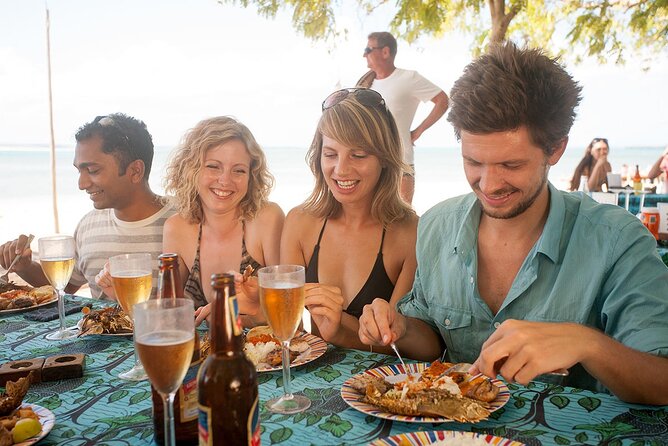 Full-Day Blue Lagoon and Sandbank Boat Tour from Zanzibar ( Safari blue) - Seafood lunch, fruit, and local drinks