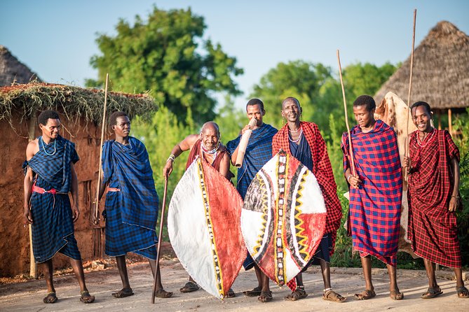 Maasai World - Trying the Bow and Arrow