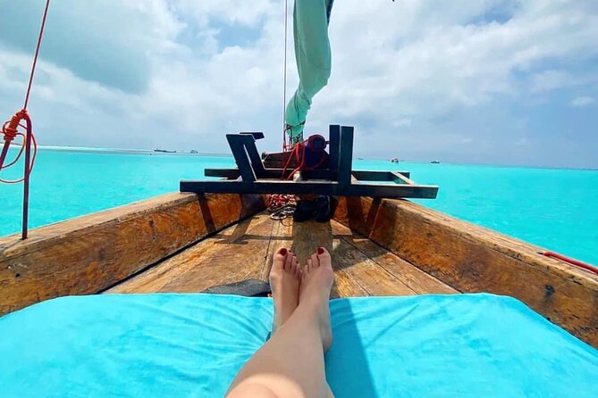 Mnemba island snorkeling tour - Pickup, timing, and cancellation