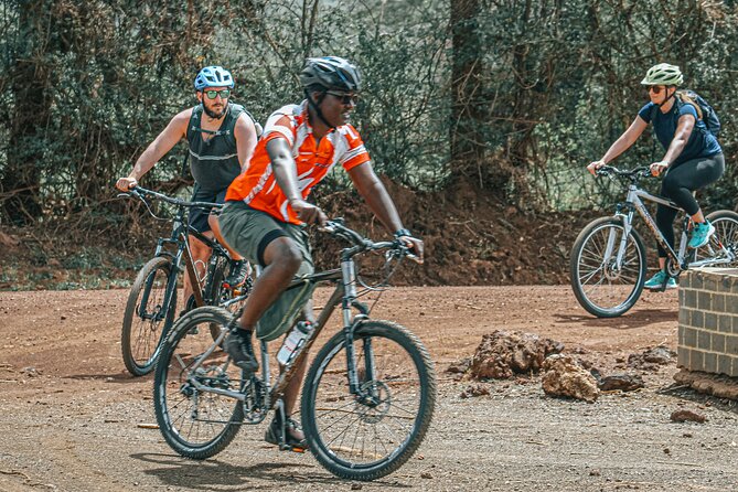 Private Cycle to Kilimanjaro Bike Park Safari - Red dirt roads and open views near Kilimanjaro