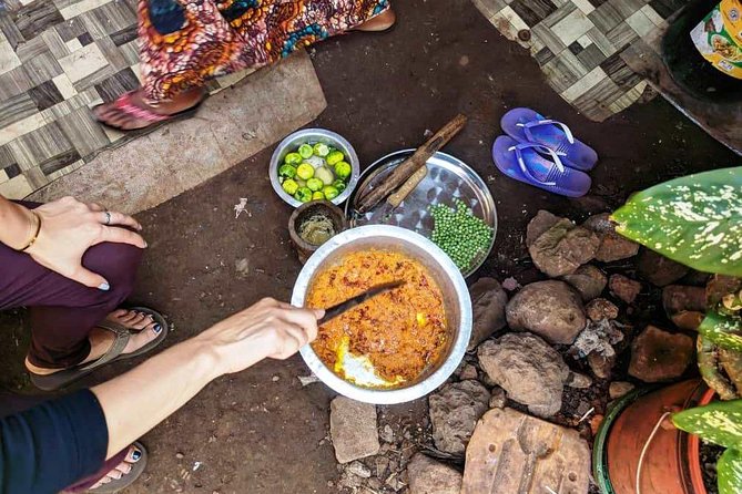 Private Market Tour and Tanzanian Cooking Class in Moshi - Making coconut milk with a traditional buzi