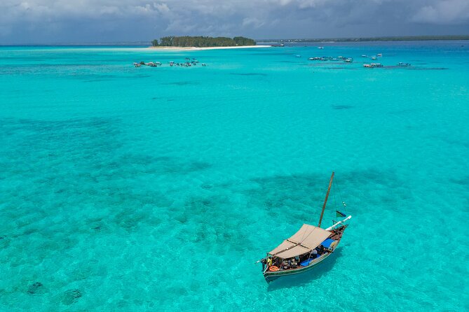 Private/Sharing: Snorkeling with Dolphins Sandbank in Mnemba - Snorkeling over Mnemba’s coral and fish
