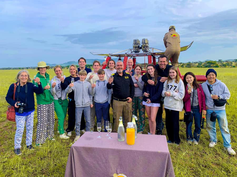 Serengeti Balloon Ride and Luxury Bush Breakfast - Landing, a toast, and breakfast in the bush