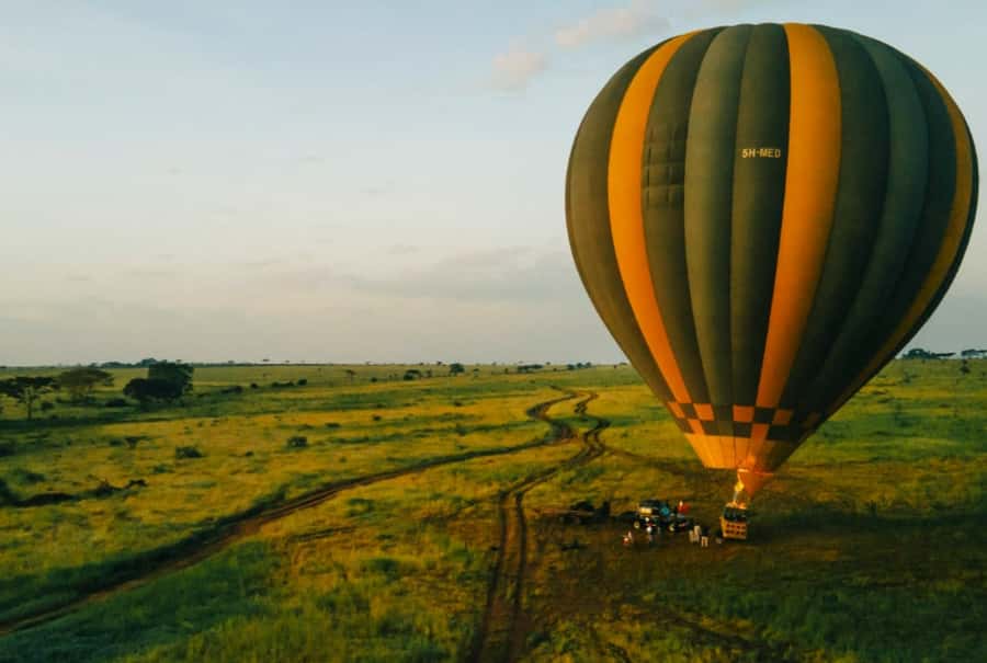Serengeti: Hot Air Balloon Flight with Champagne Breakfast - Before dawn, the Serengeti begins to glow