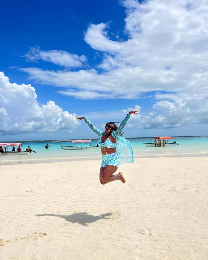 Snorkel Mnemba’s Reefs & Swim with Dolphins Adventure - Fruit, water, and a welcome pause