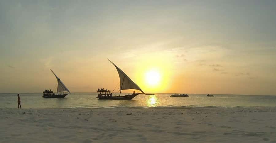 Stone Town: Traditional Dhow Sunset Cruise - Music, Dancing, Fruit, and Soft Drinks