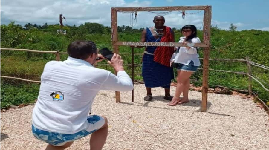Zanzibar: Maasai World Tour with Cultural Practices - Trying traditional clothing and Maasai archery