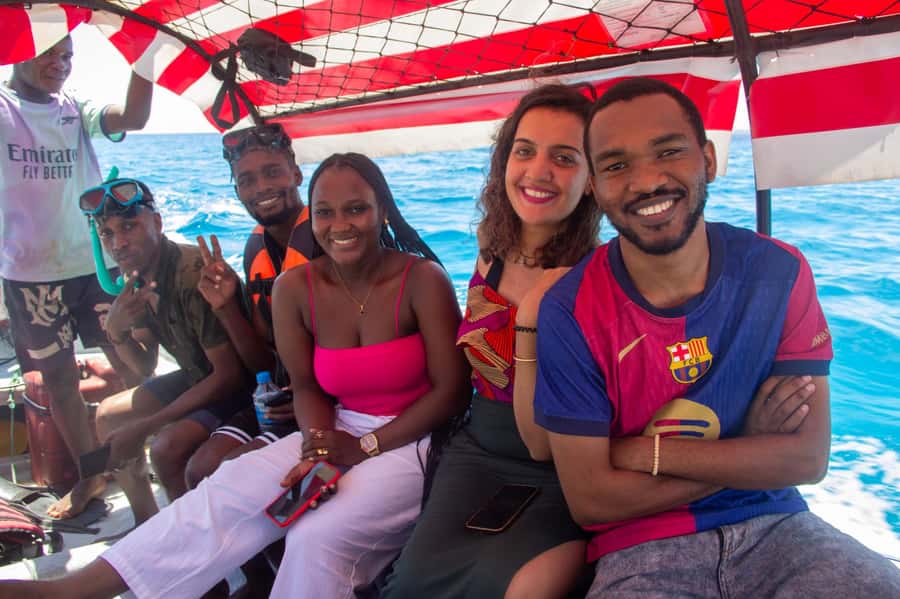 Zanzibar: Mnemba island Snorkeling & Boat Tour with Lunch - Snorkeling among coral, fish, and starfish