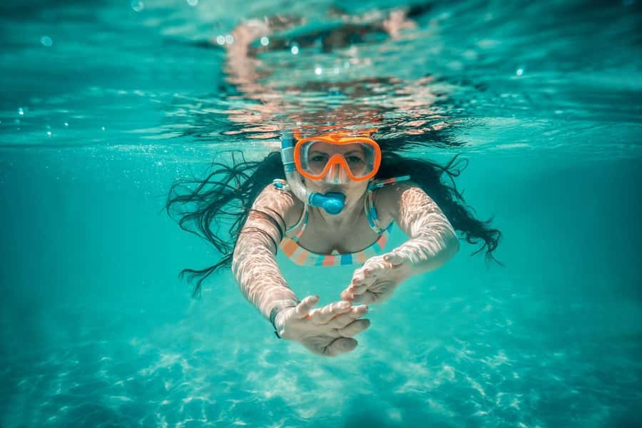 Zanzibar Mnemba island snorkling & swim with turtles Tour - Clear water and coral life around Mnemba Island