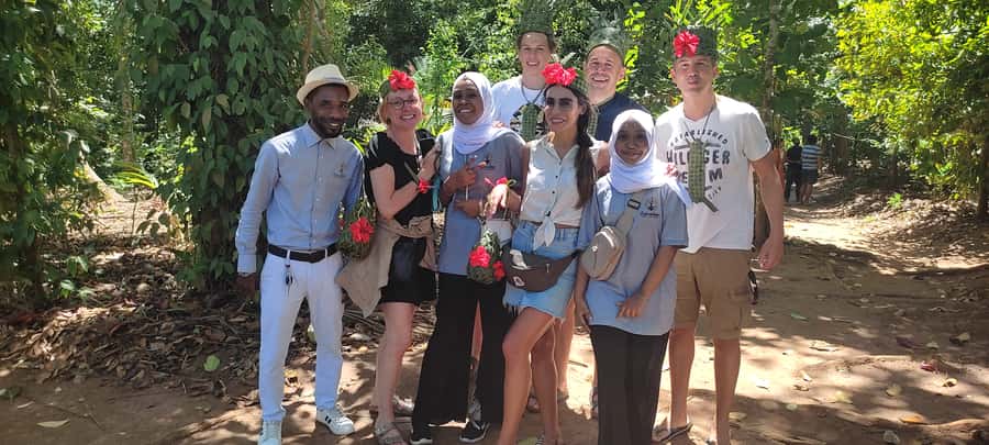 Zanzibar: Spice Farm Tour with Traditional Cooking Lesson - Tropical fruit, jackfruit, and a coconut from the tree